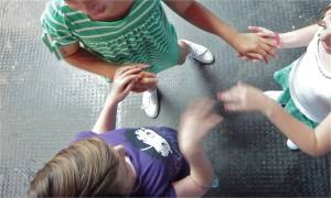 Girls clapping from above